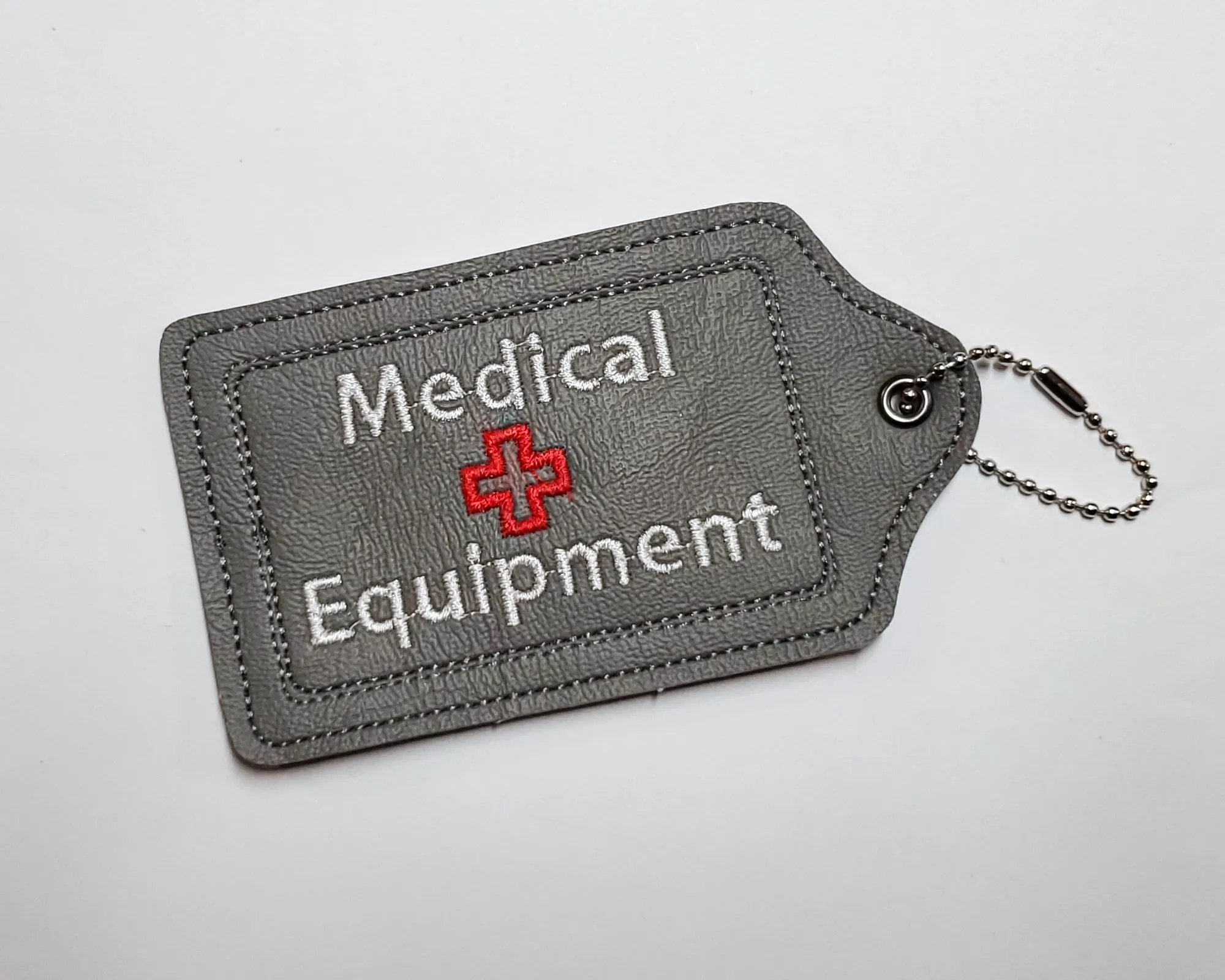 Dark Gray Medical Equipment Luggage Tag